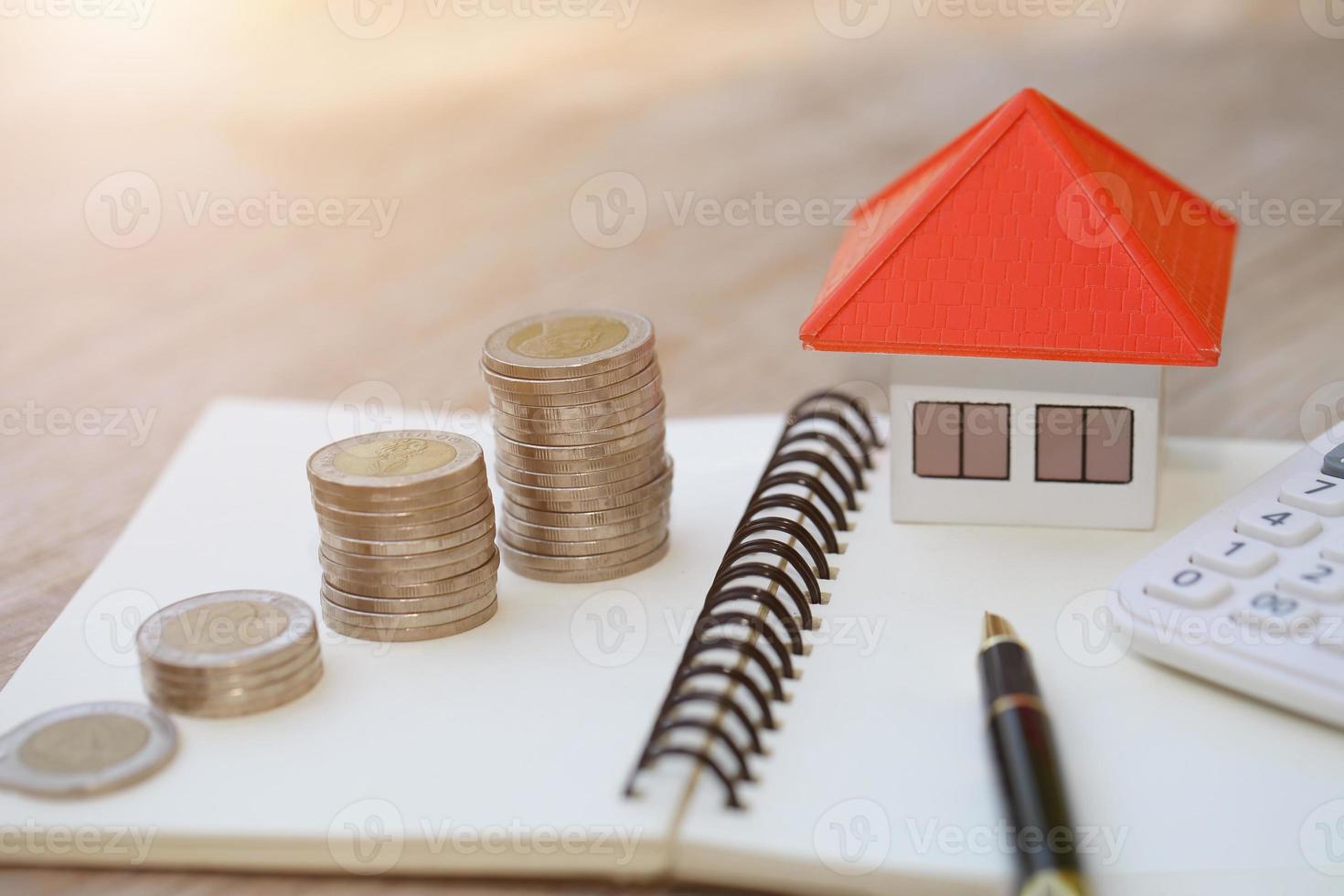 planning savings money of coins to buy a home, concept for property ladder, mortgage and real estate investment. for saving or investment for a house, growing business photo