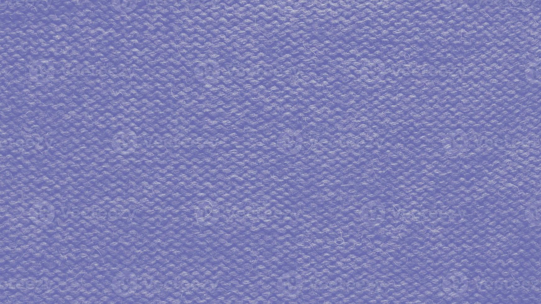 Texture of smooth knitted sweater with pattern. Handmade knitting wool or cotton fabric texture. Background of knitting patterns front and back stitch. photo