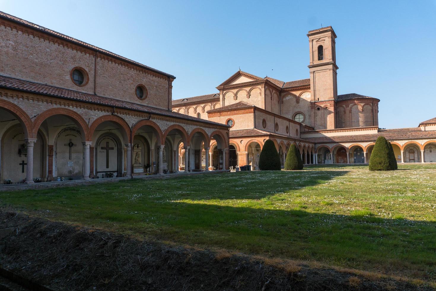 Ferrara,Italy-march 20,2022-strolling inside the monumental cemetery of the charterhouse of Ferrara during a sunny day. photo