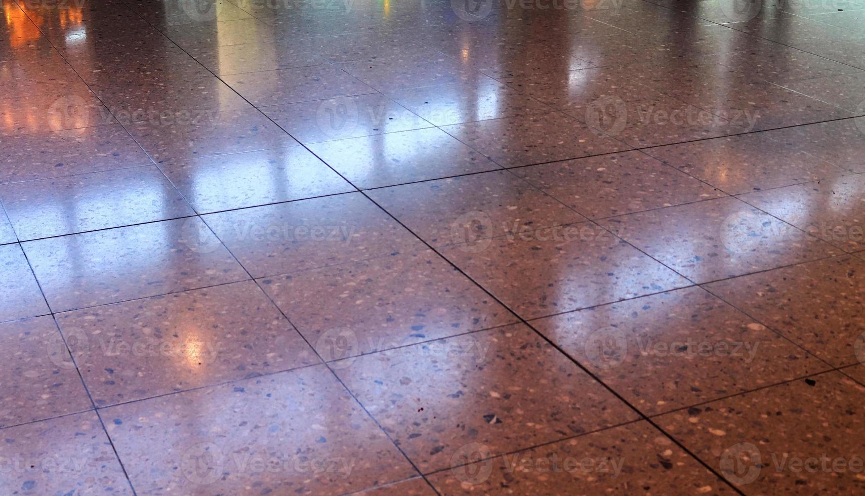 Detailed close up texture on structured floor tiles on the ground photo