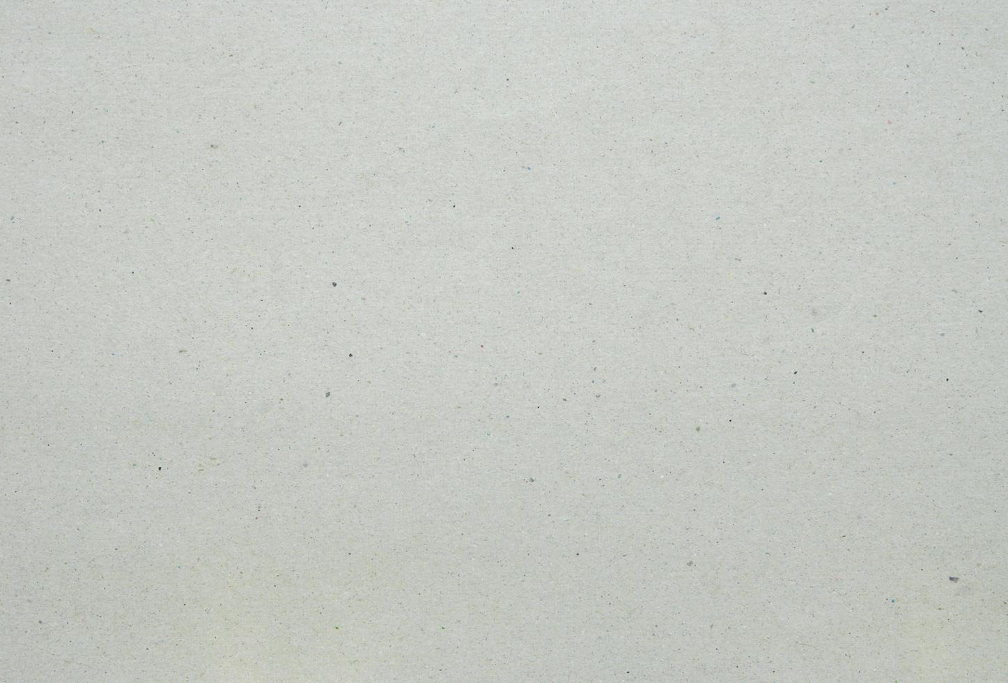 Grey recycled cardboard texture or background photo