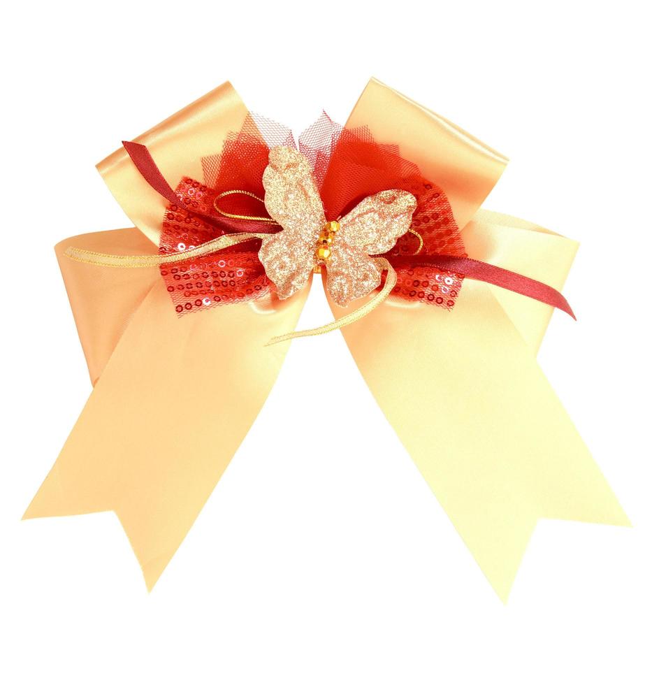 gold gift ribbon and bow on white background with clipping path photo