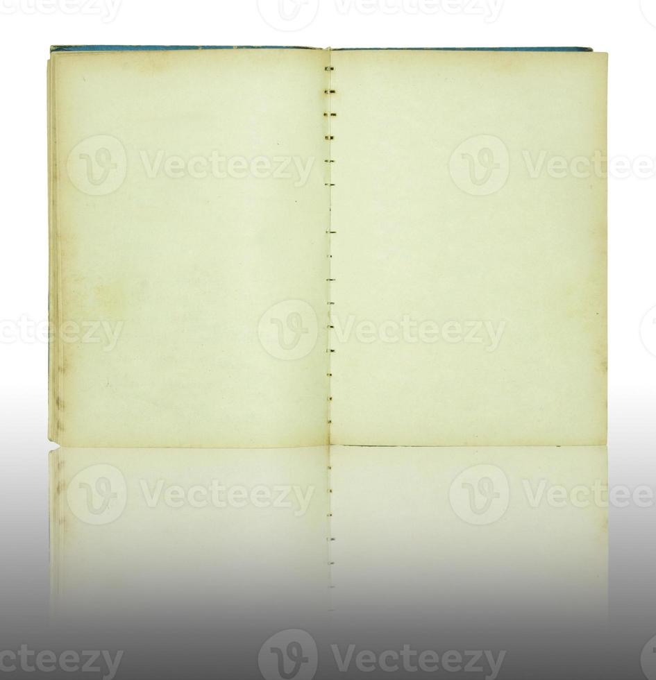 Old book open on reflect floor and white background with clipping path photo