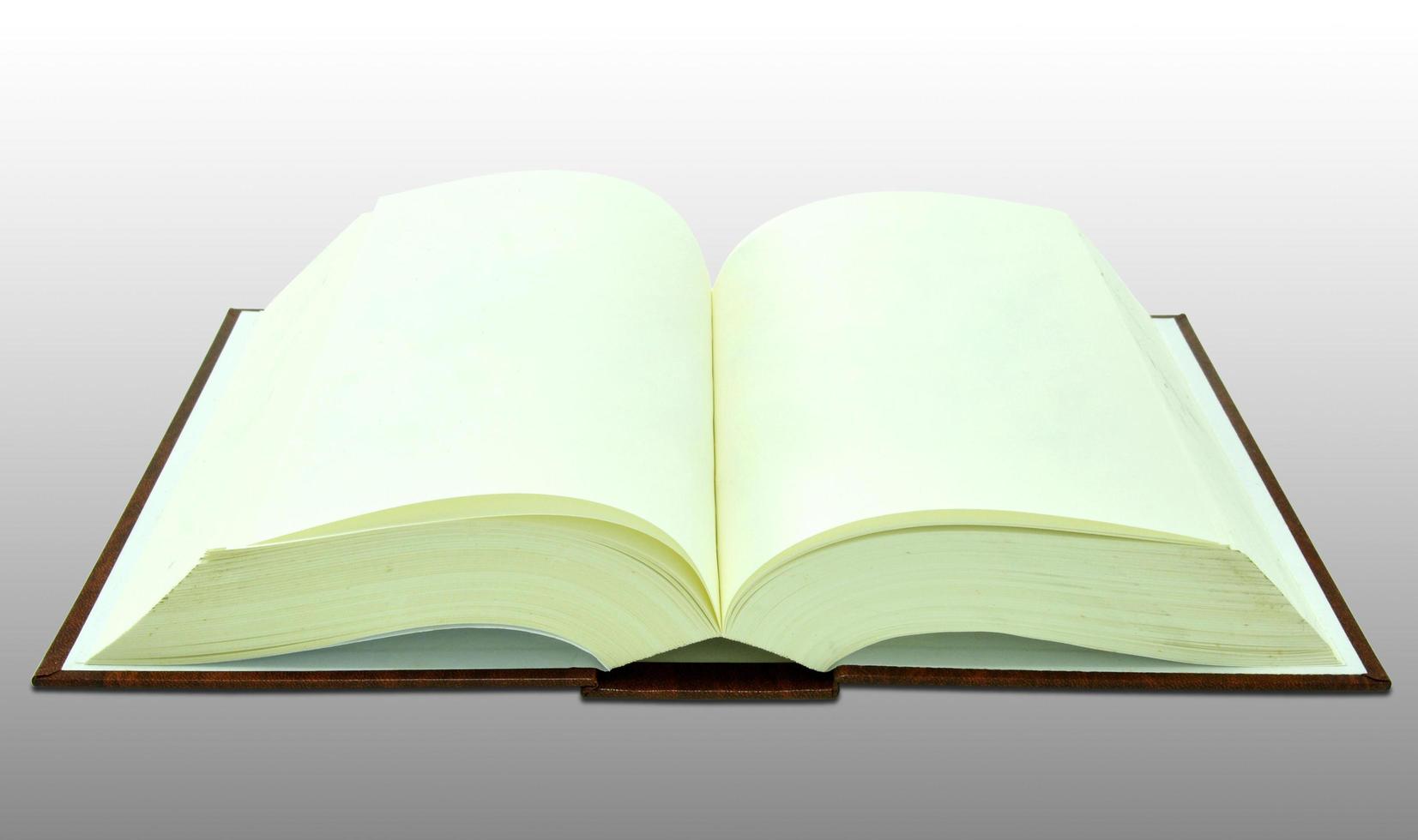 Open blank book on white with clipping path photo