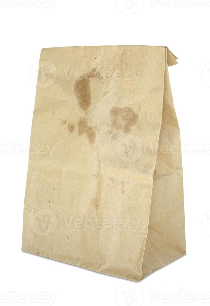 Brown paper bag isolated on white photo