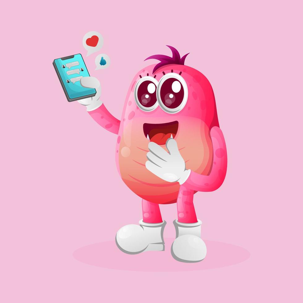 Cute pink monster holding mobile phone with text messages vector