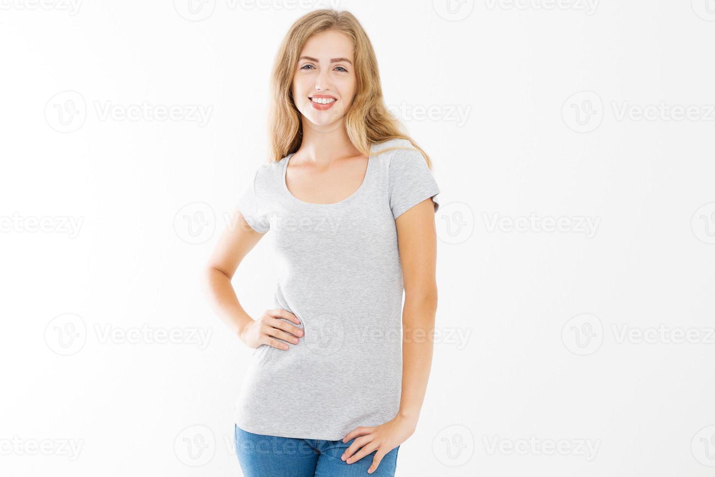 Young blonde woman with fit slim body in blank template t shirt and jeans isolated on white background. Skin and hair care. Copy space and mock up photo