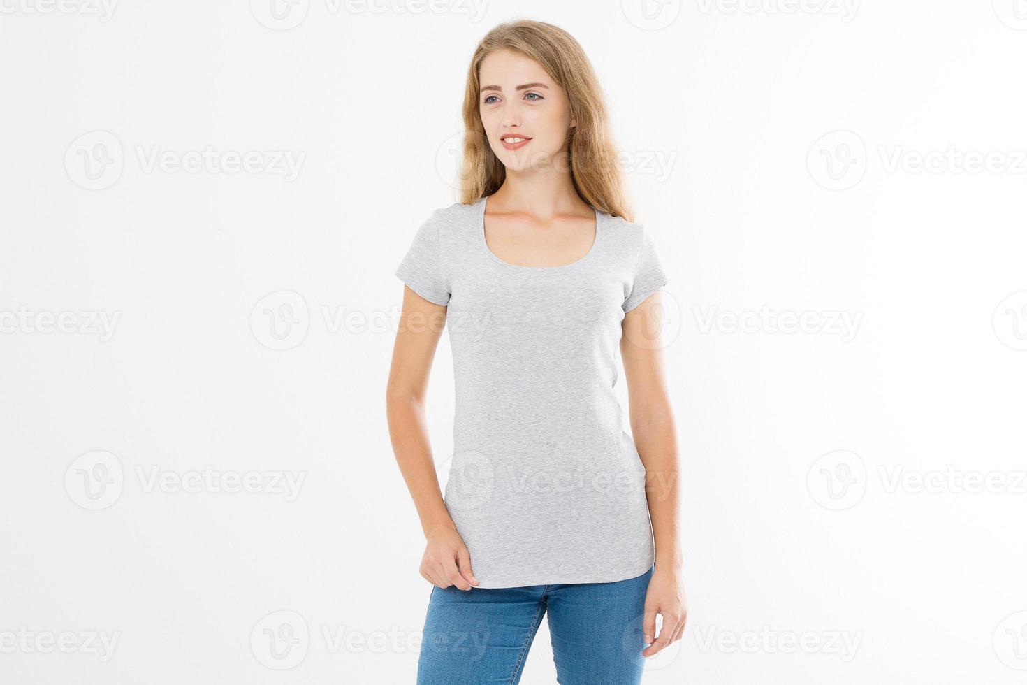 Young blonde woman with fit slim body in blank template t shirt and jeans isolated on white background. Skin and hair care. Copy space and mock up photo