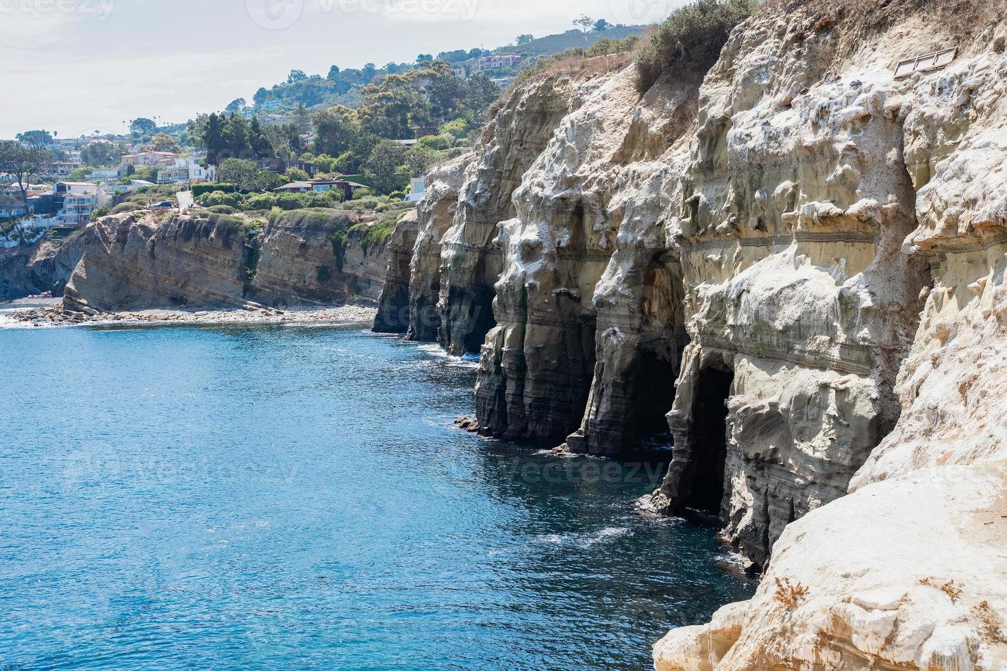 Cliffside rock erosion caves photo