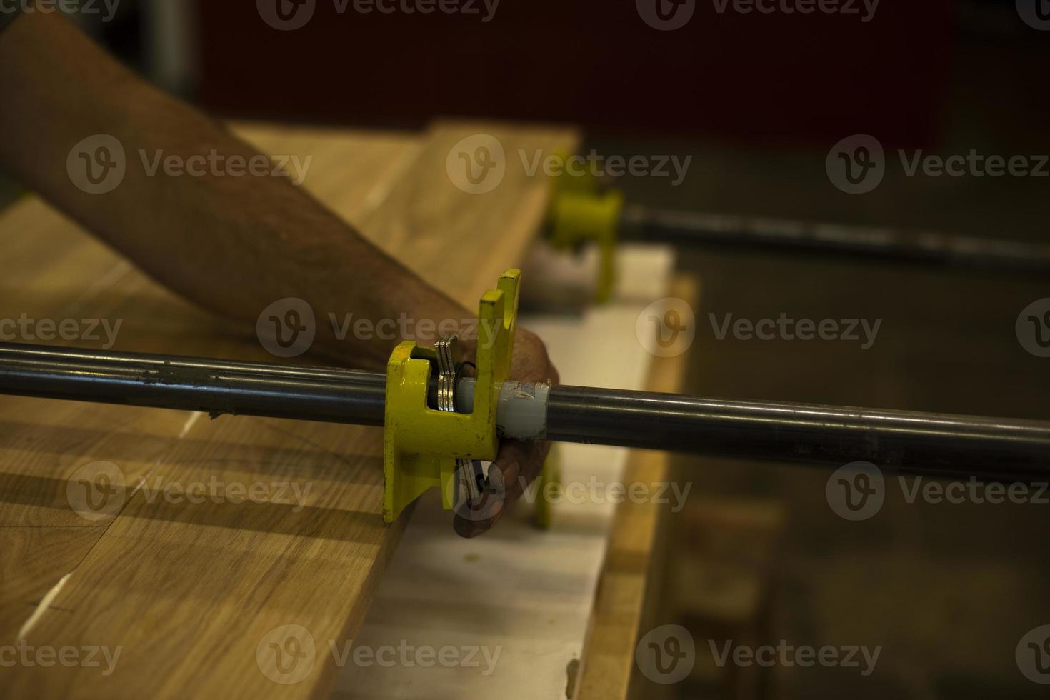 Fasteners for wood. Board holder. Furniture details. Wood workshop. Plywood squeezing. photo