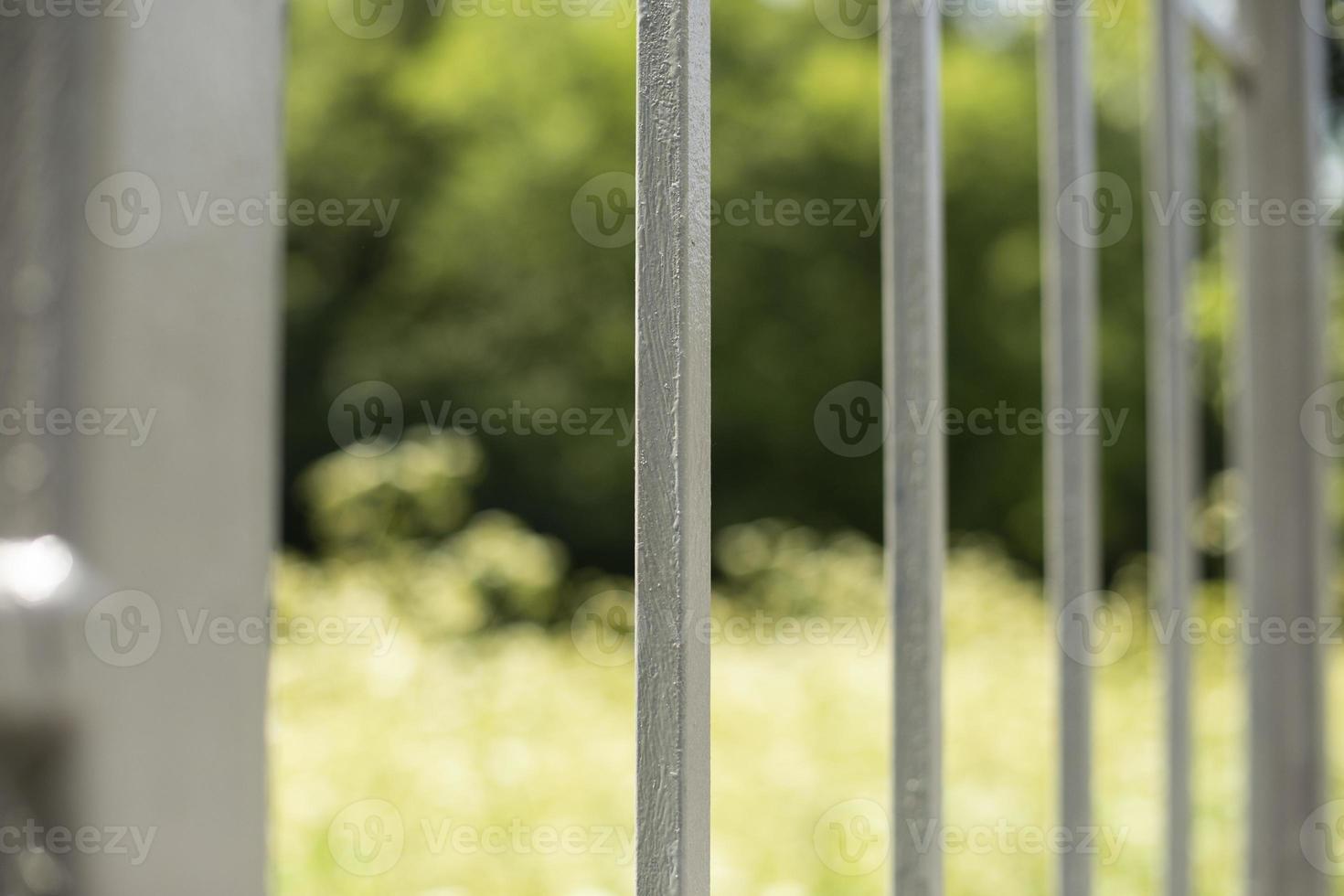 Fence in detail. Fence around house. Barrier for outsiders. photo