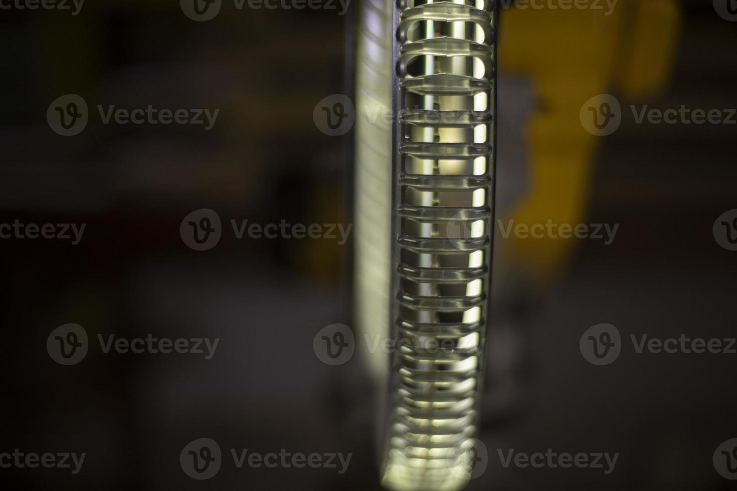 Illumination of saw on tool. Plastic part. photo