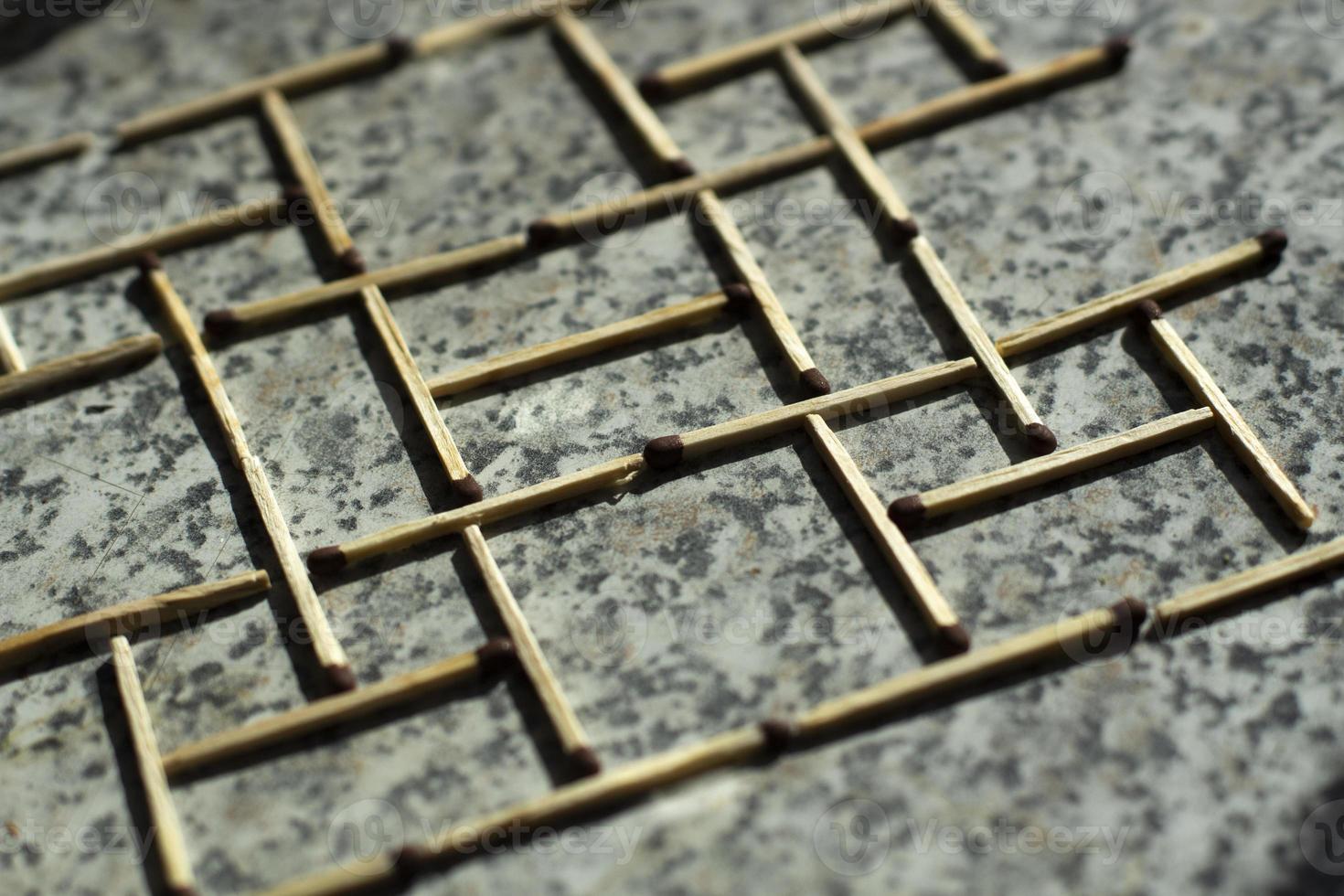 Matches on table. Puzzle of sticks. Texture from matches. photo
