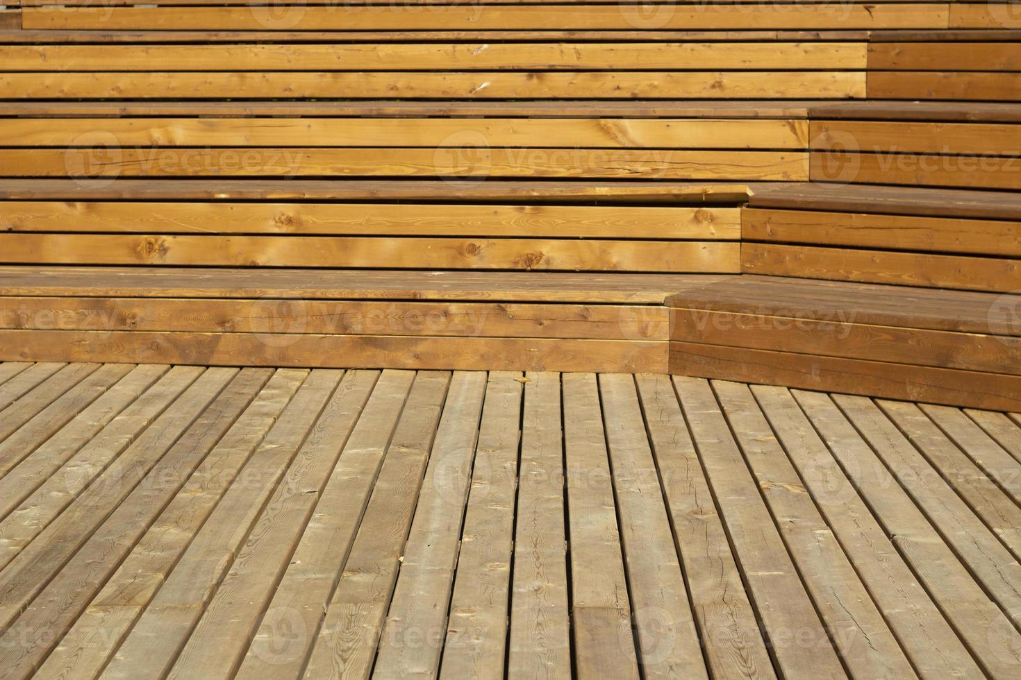 Wooden steps. Place for students to relax. Wooden benches. Scene details. Tribune for speeches. photo