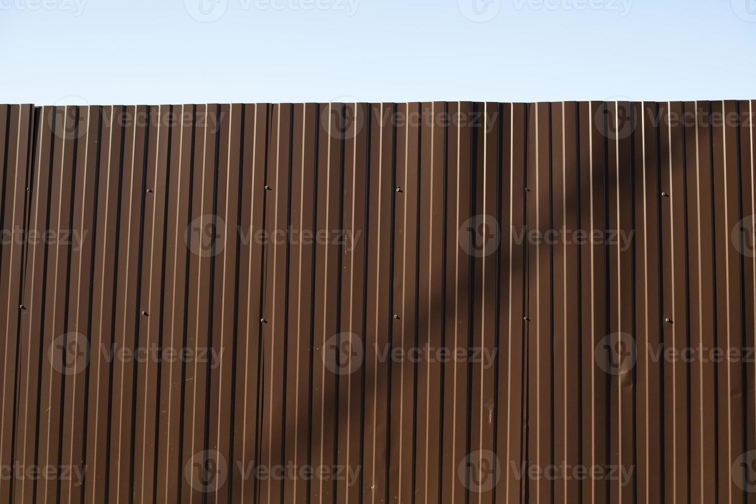 Fence in detail. Fence around house. Barrier for outsiders. photo