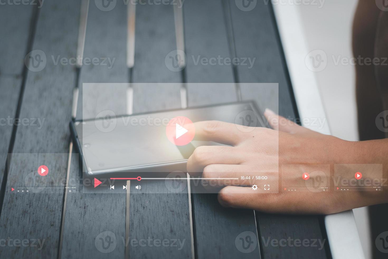 Concept of streaming online. Men's hands showing streaming screen. To represent the use of the Internet online photo