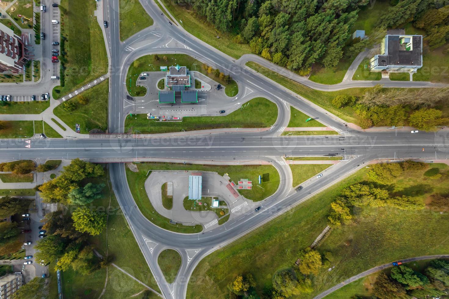 aerial view of road interchange or highway intersection. Junction network of transportation taken by drone. photo