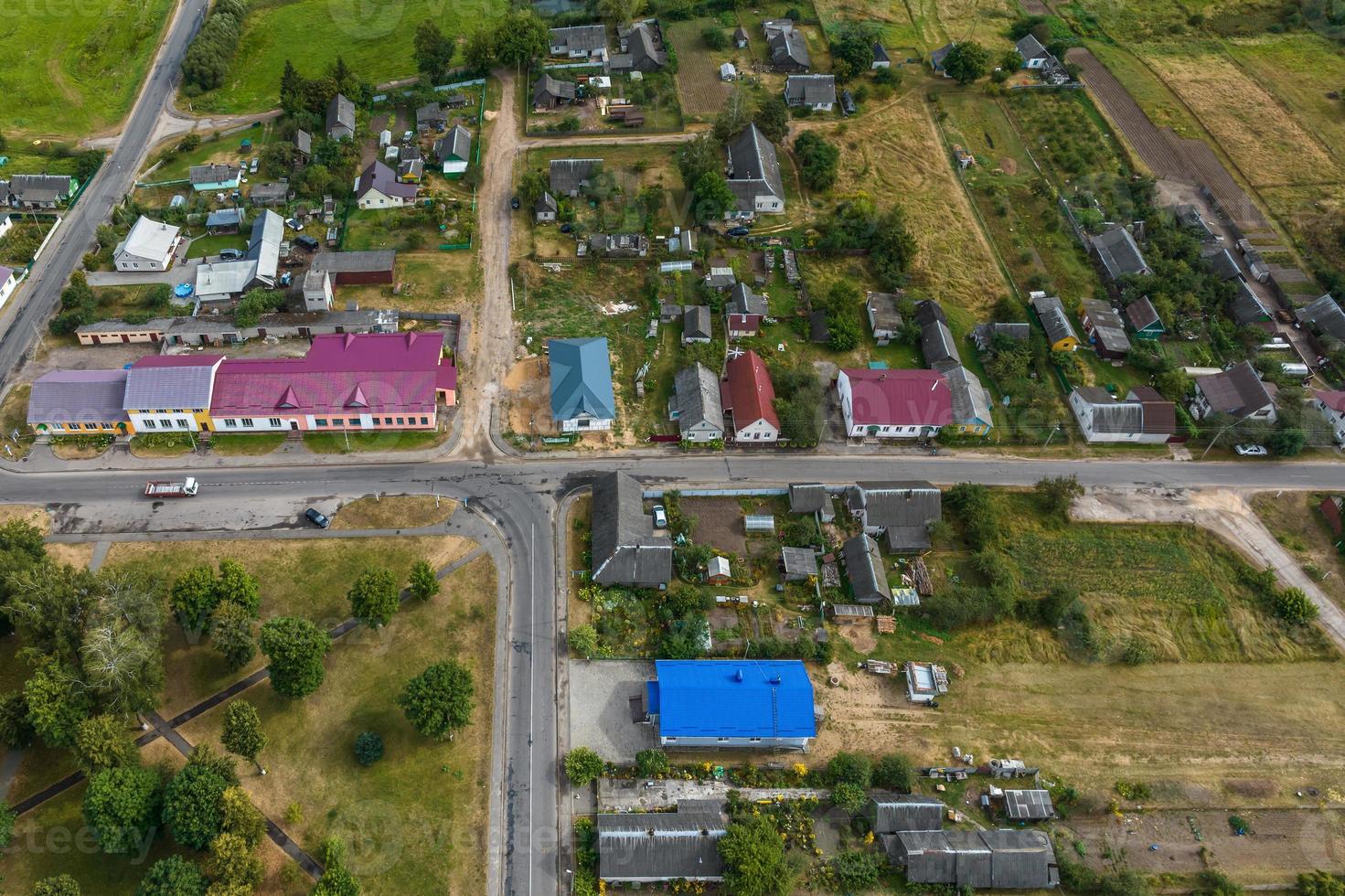 panoramic aerial view of private development with country houses or village photo