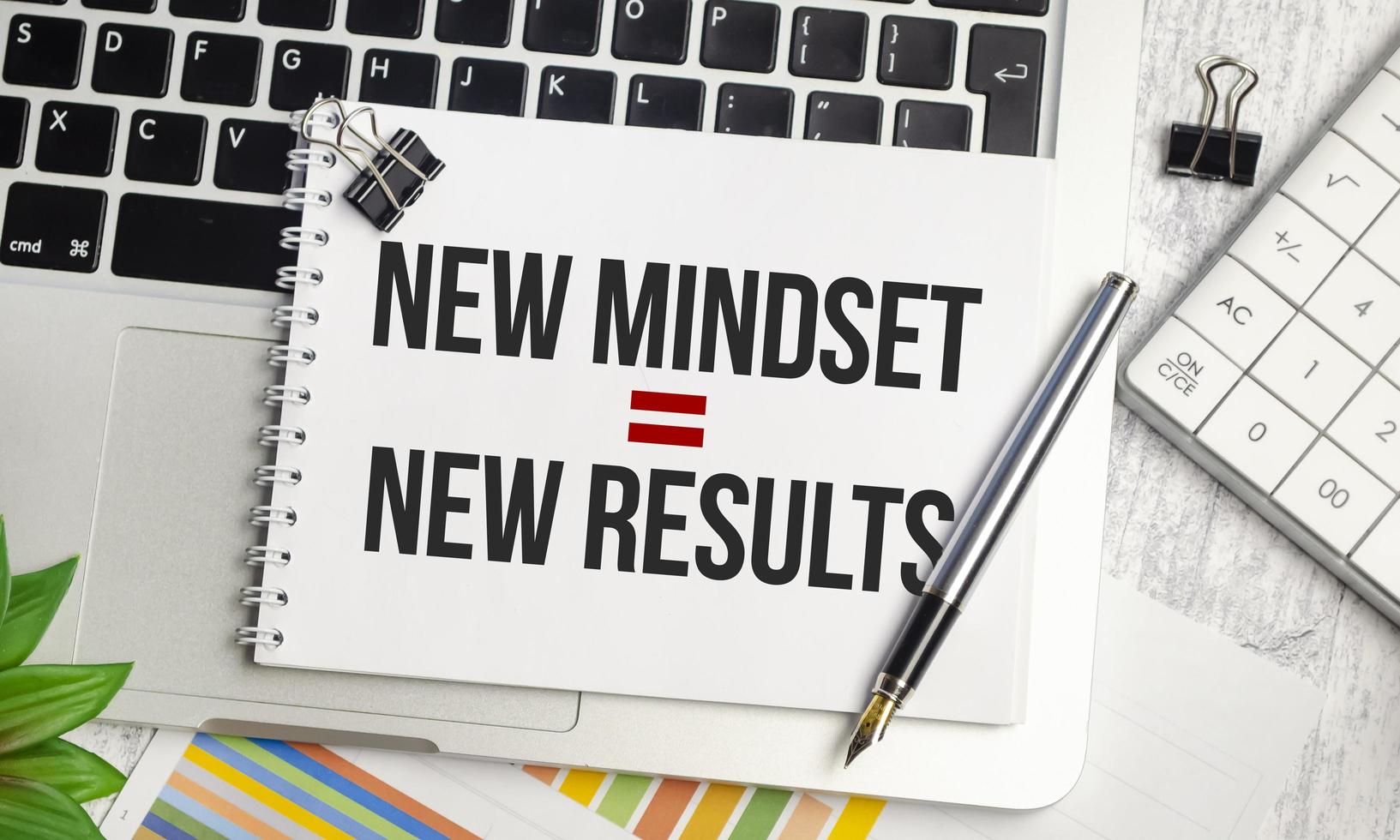 New Mindset - New Results on paper notebook and laptop photo