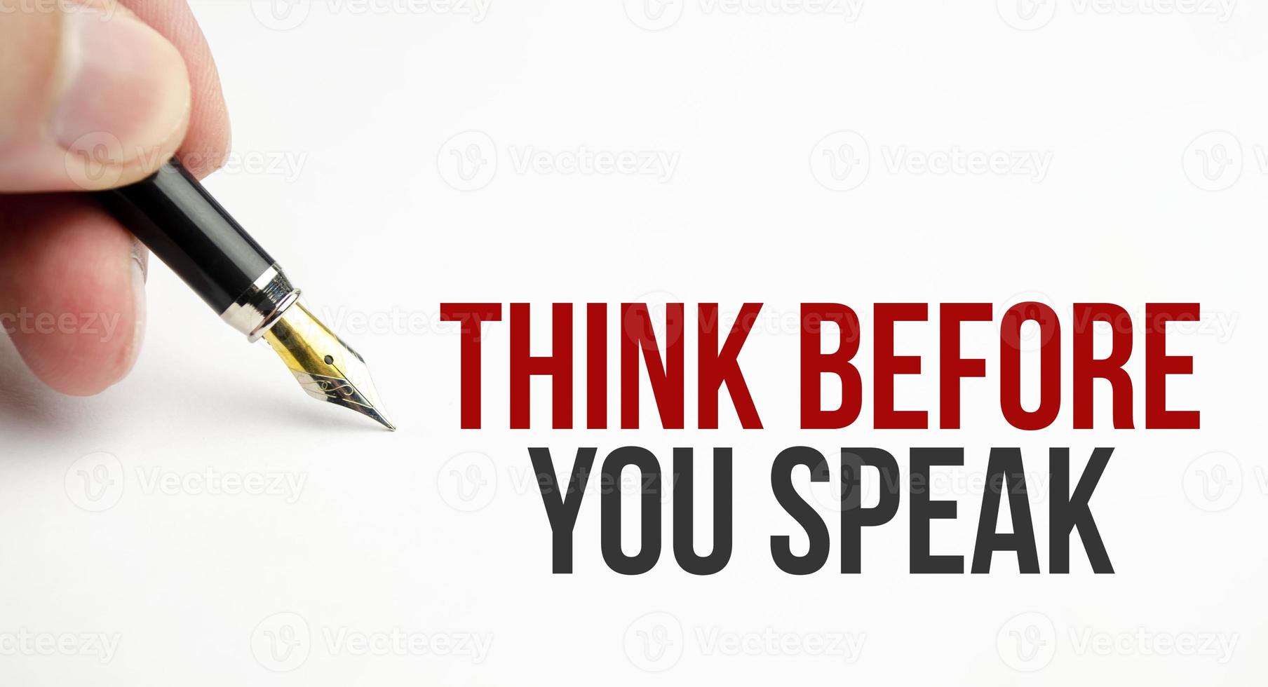 think before you think words on white paper and pen photo