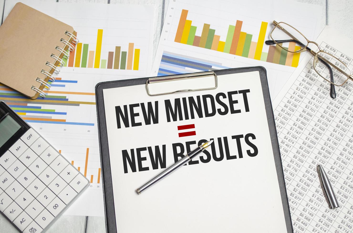 New Mindset - New Results on paper tablet and charts photo