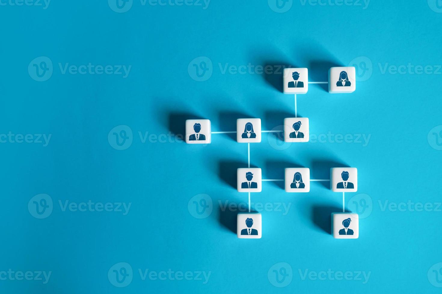 Business team hierarchy. Connections and relationships in the company. Personnel management. People connected in hierarchical system. Separation of roles and responsibilities. Career. Teamwork photo