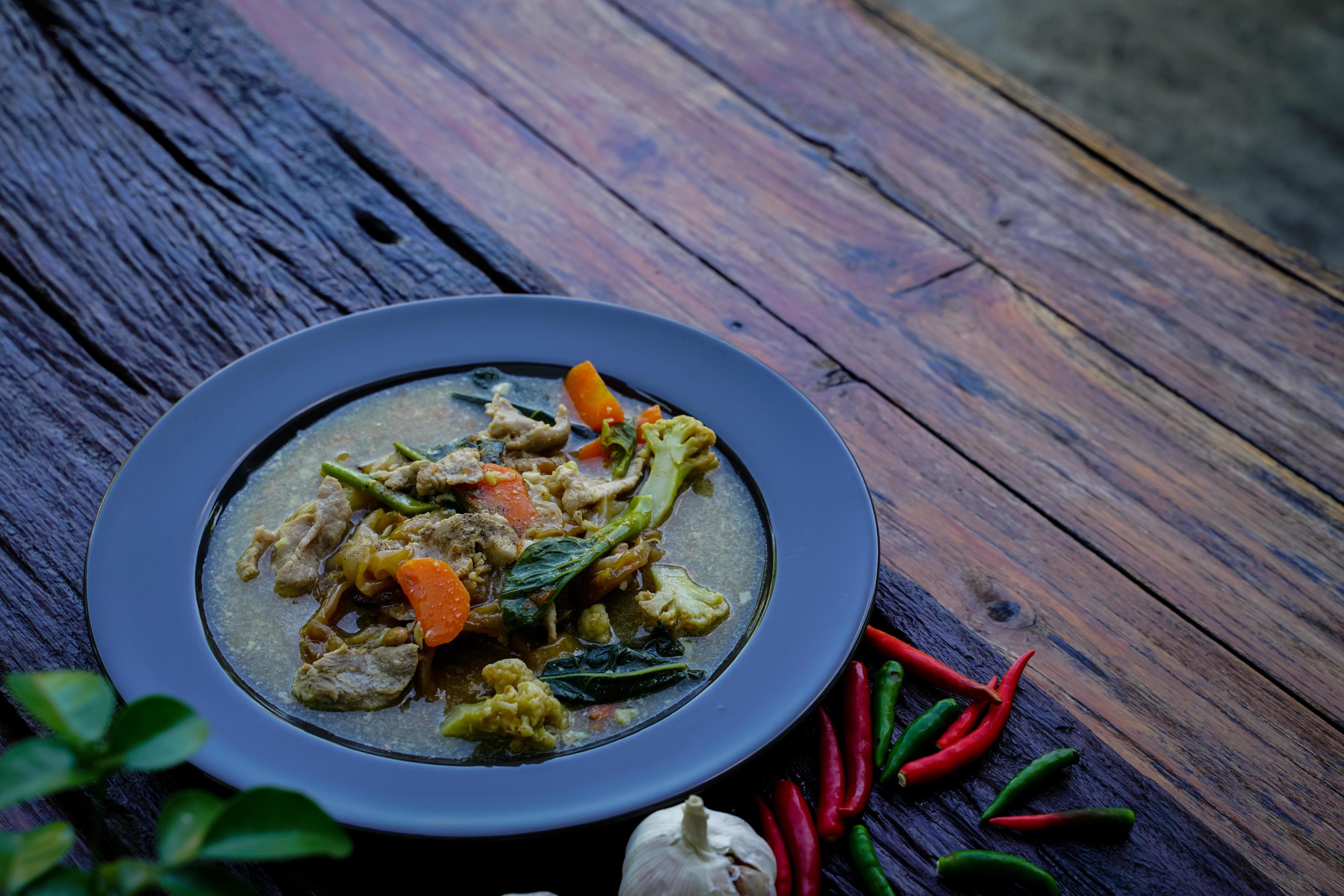 stir-fried-noodles-with-pork-and-kale-in-gravy-chinese-food-and-thai