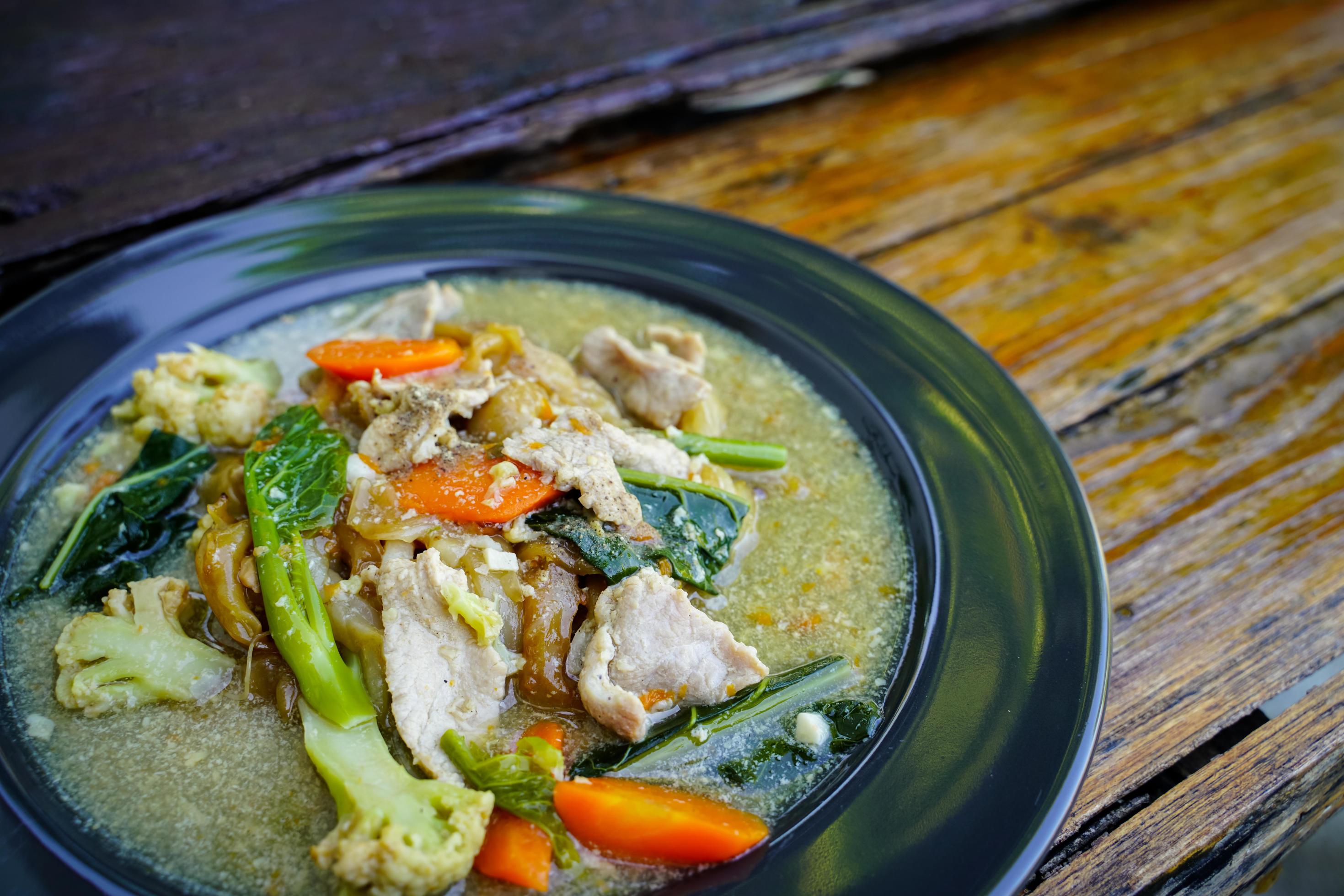 stir-fried-noodles-with-pork-and-kale-in-gravy-chinese-food-and-thai