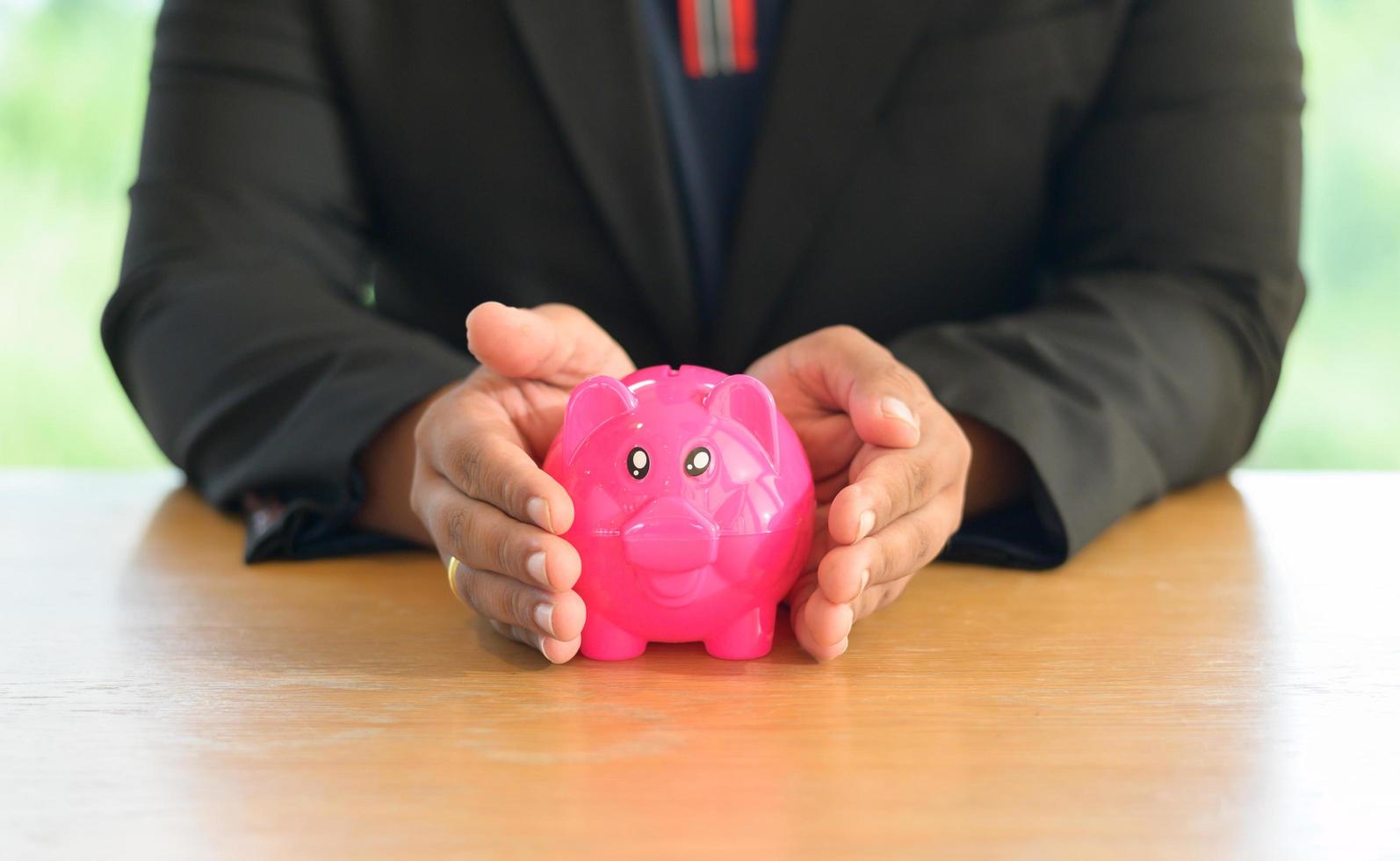 piggy bank on table with space photo