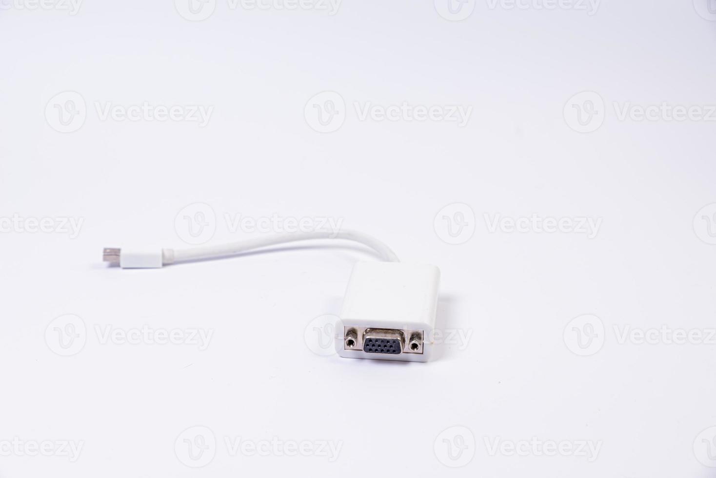 various converter cables adapters for computers and smartphones HDMI VGA USB DVI DP isolated on white photo