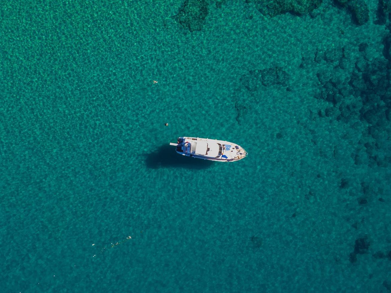 aerial sea and boat. bird's eye view over the blue sea. amazing view of the blue sea photo