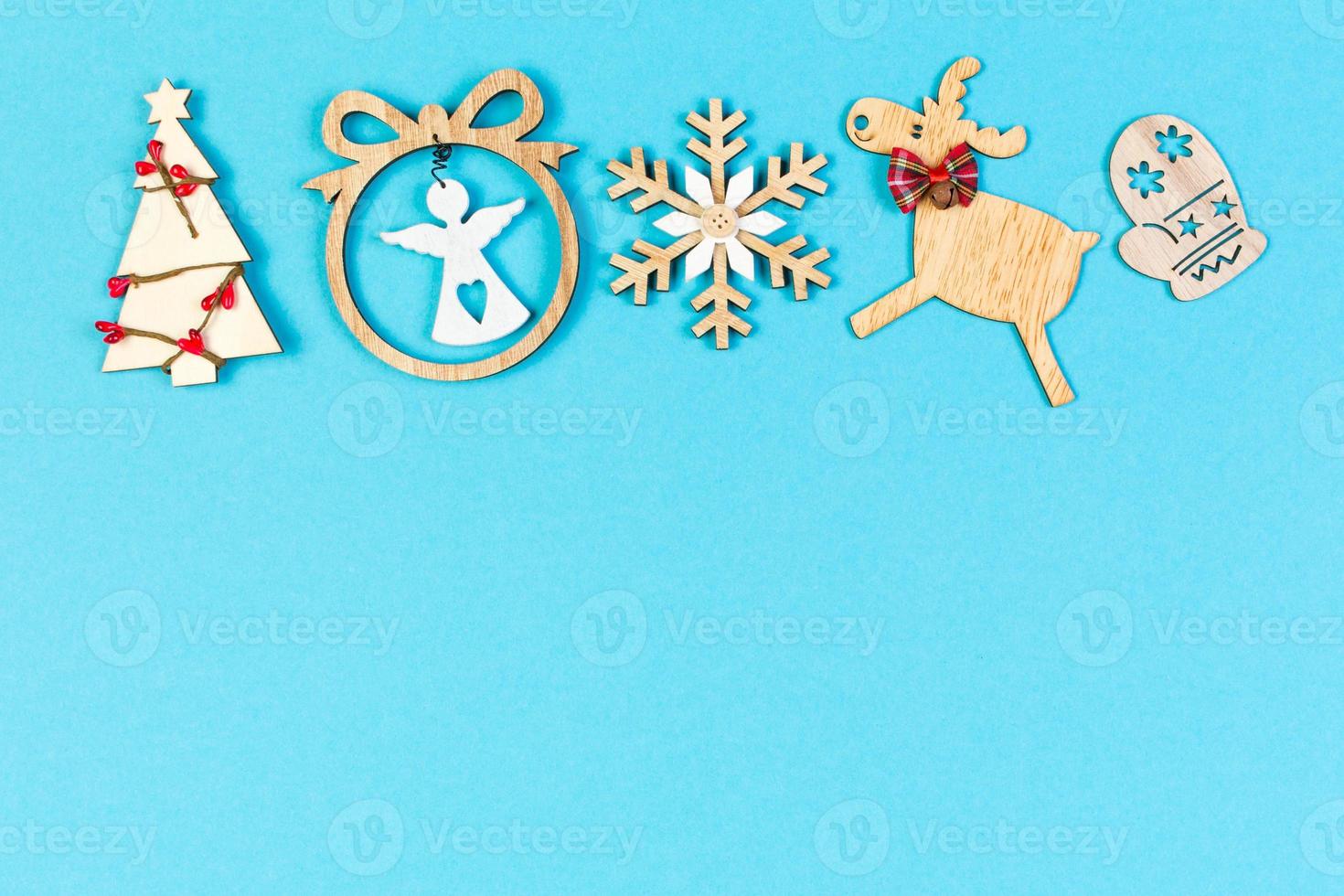 Top view of holiday ornament made of Christmas decorations on colorful background. New Year time concept with copy space photo
