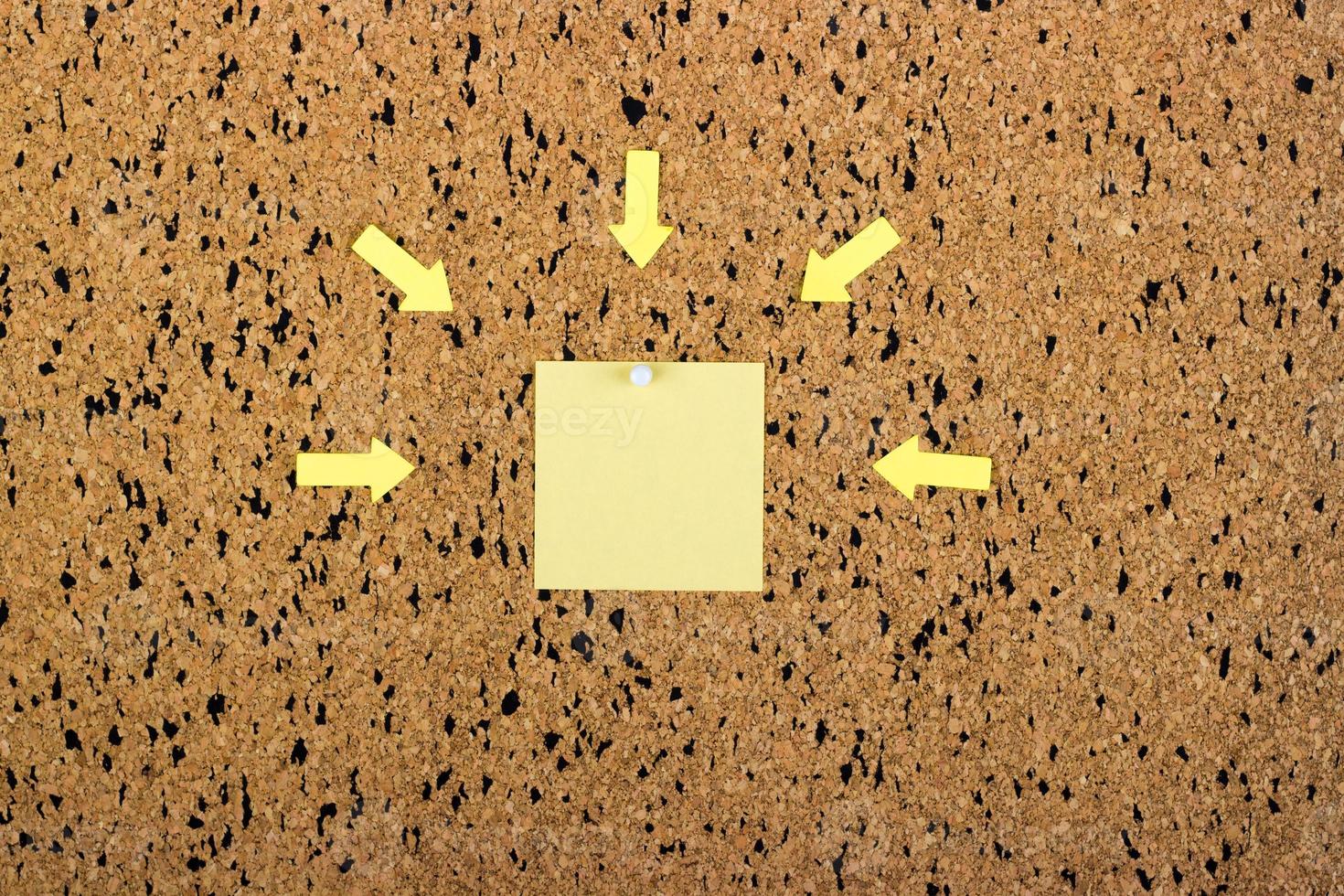 sticky note on cork board, empty space for text photo