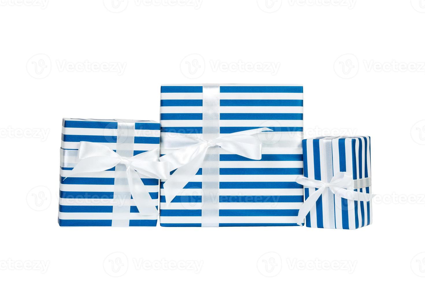 Set of Christmas or other holiday handmade present in blue paper with white ribbon. Isolated on white background, top view. thanksgiving Gift box concept photo