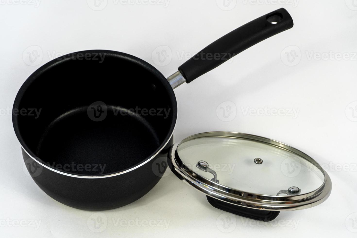 cookware set, steel dinner set isolated on white background, black metal cookware set photo