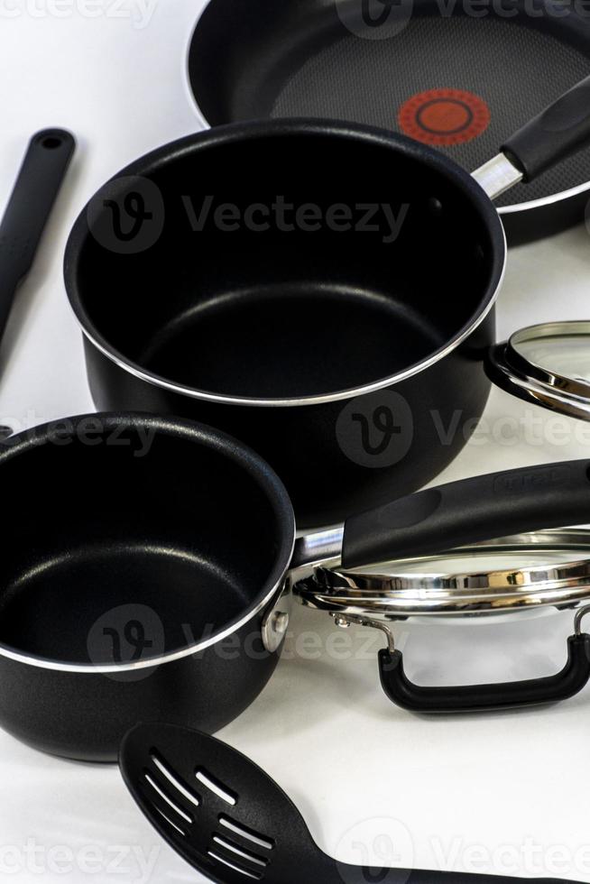 cookware set with white bottom, cookware, metal, black handle, mexico photo