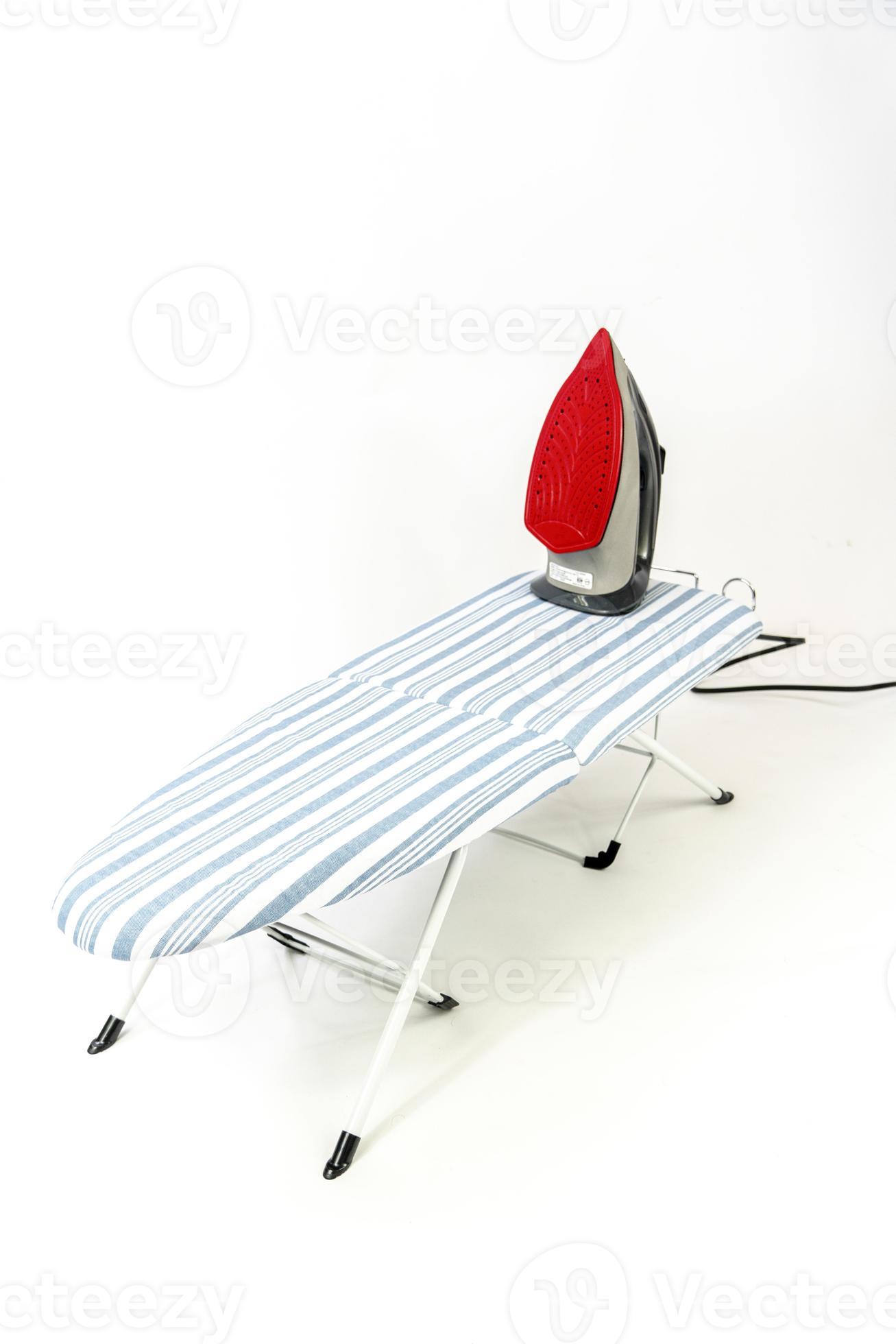 new clothes iron on white background, red ceramic iron, and blue fabric ironing board base