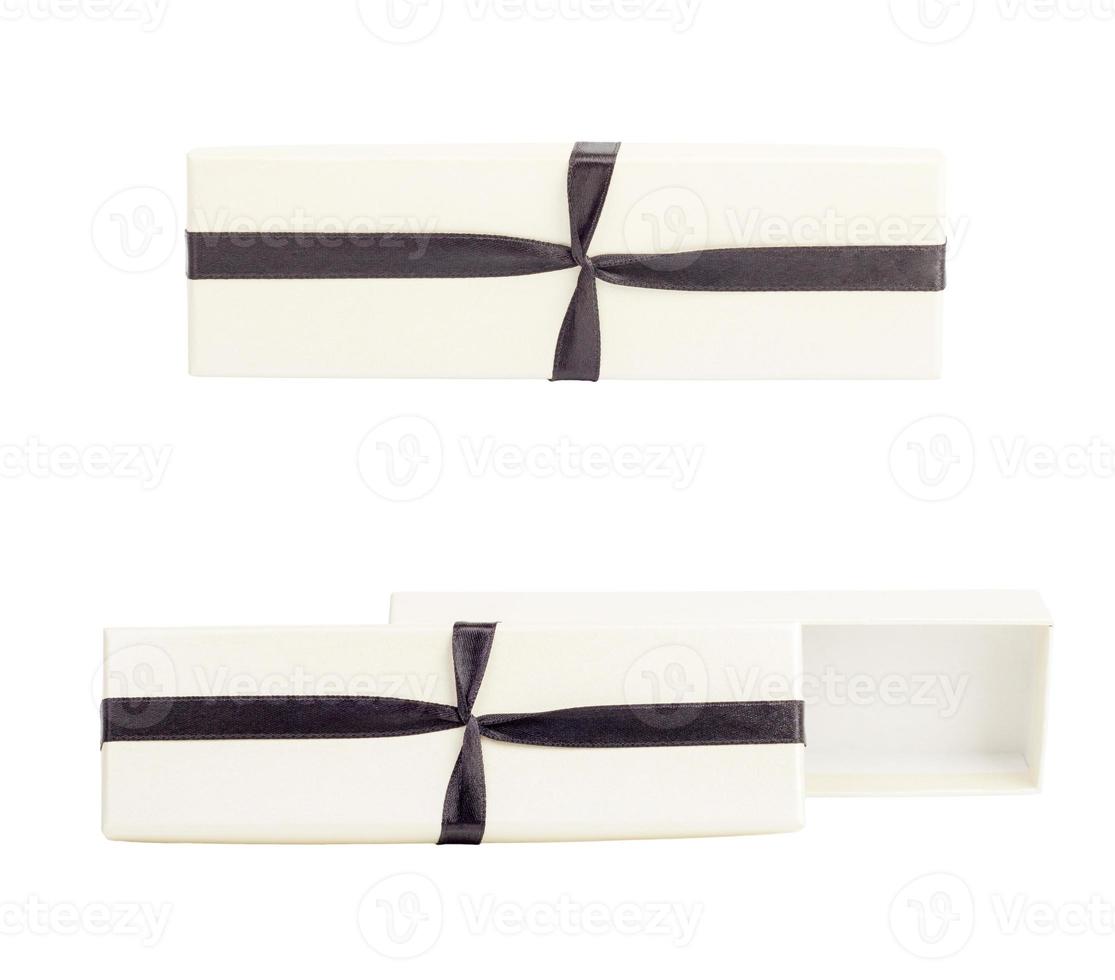 White box with a bow studio photo of white box wrapping ribbon.