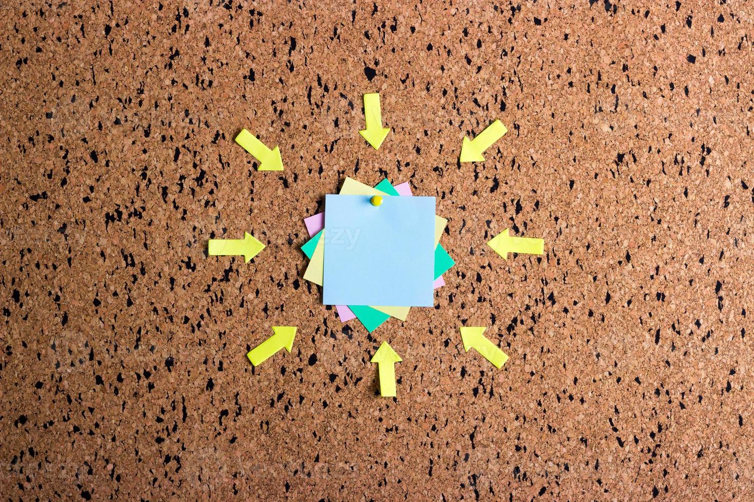 sticky note on cork board, empty space for text photo