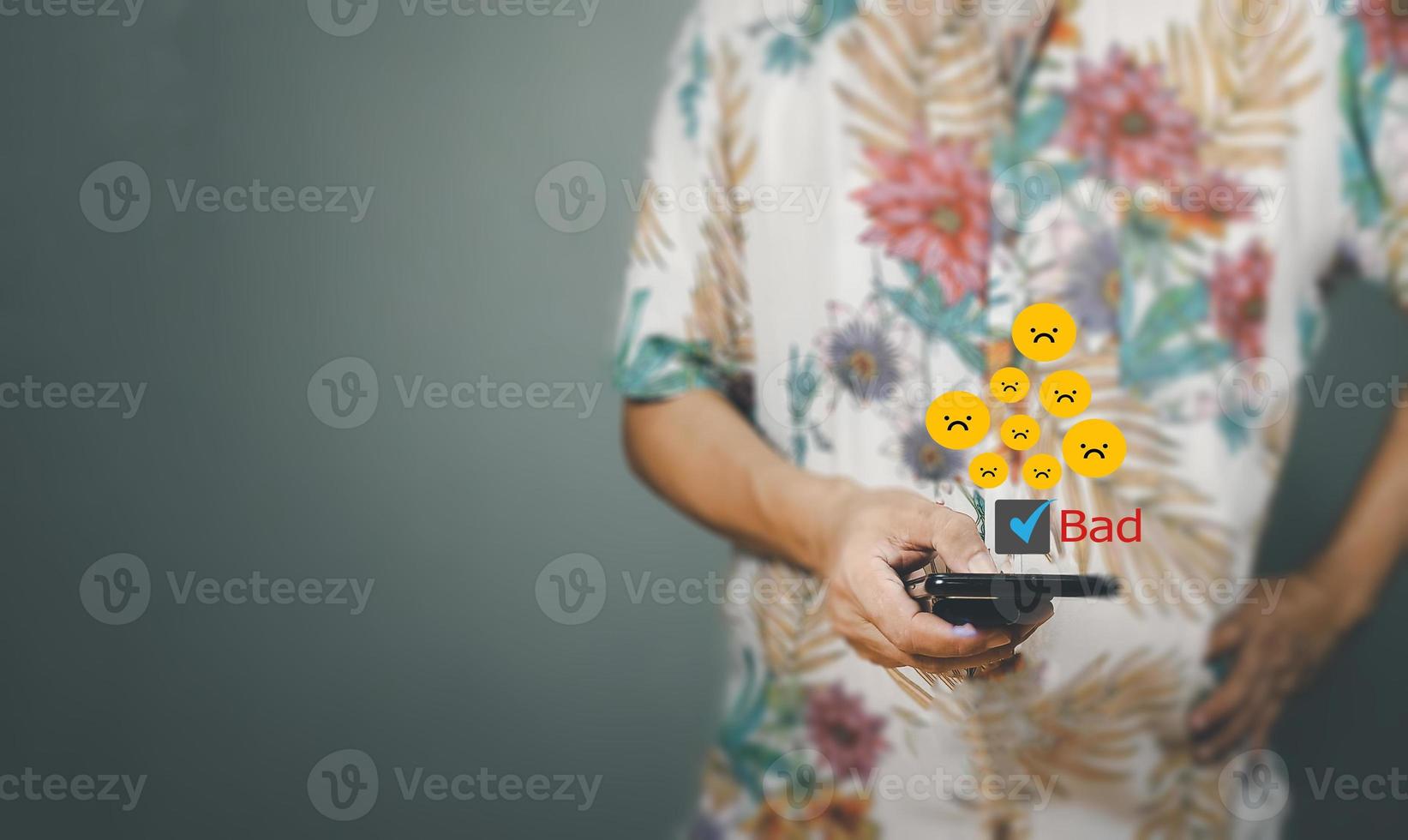 Customer Experience dissatisfied Concept, Unhappy Businessman Client with Sadness Emotion Face on smartphone screen, Bad review, bad service dislike bad quality, low rating, social media not good. photo