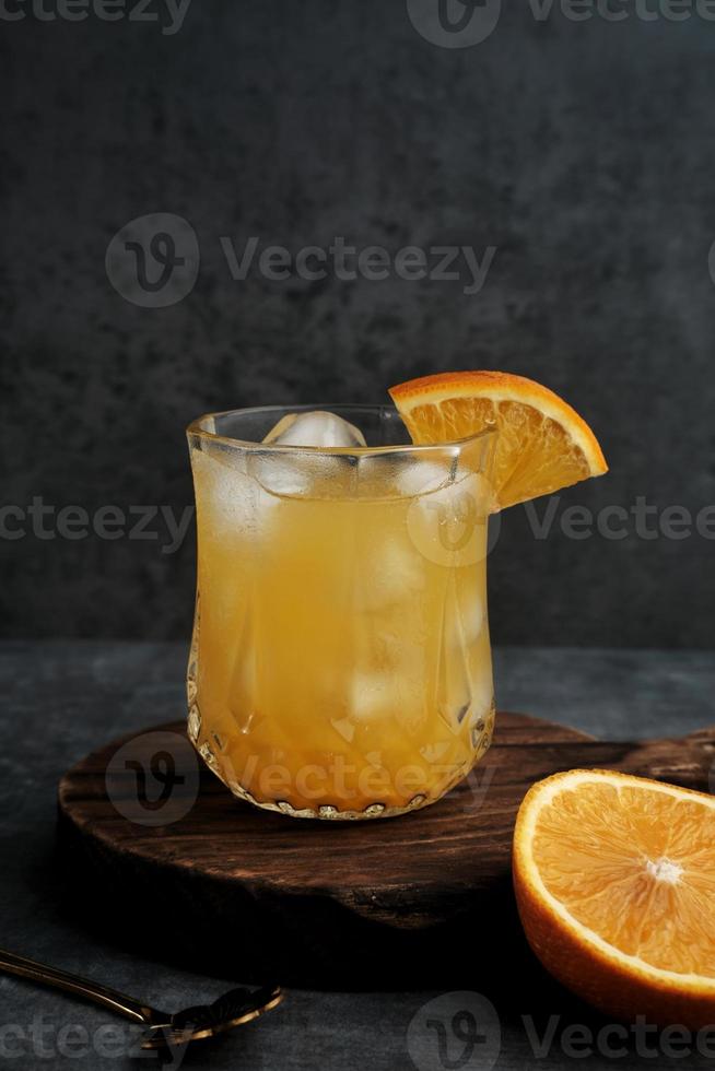 Orange juice in glass, cold pressed juice photo