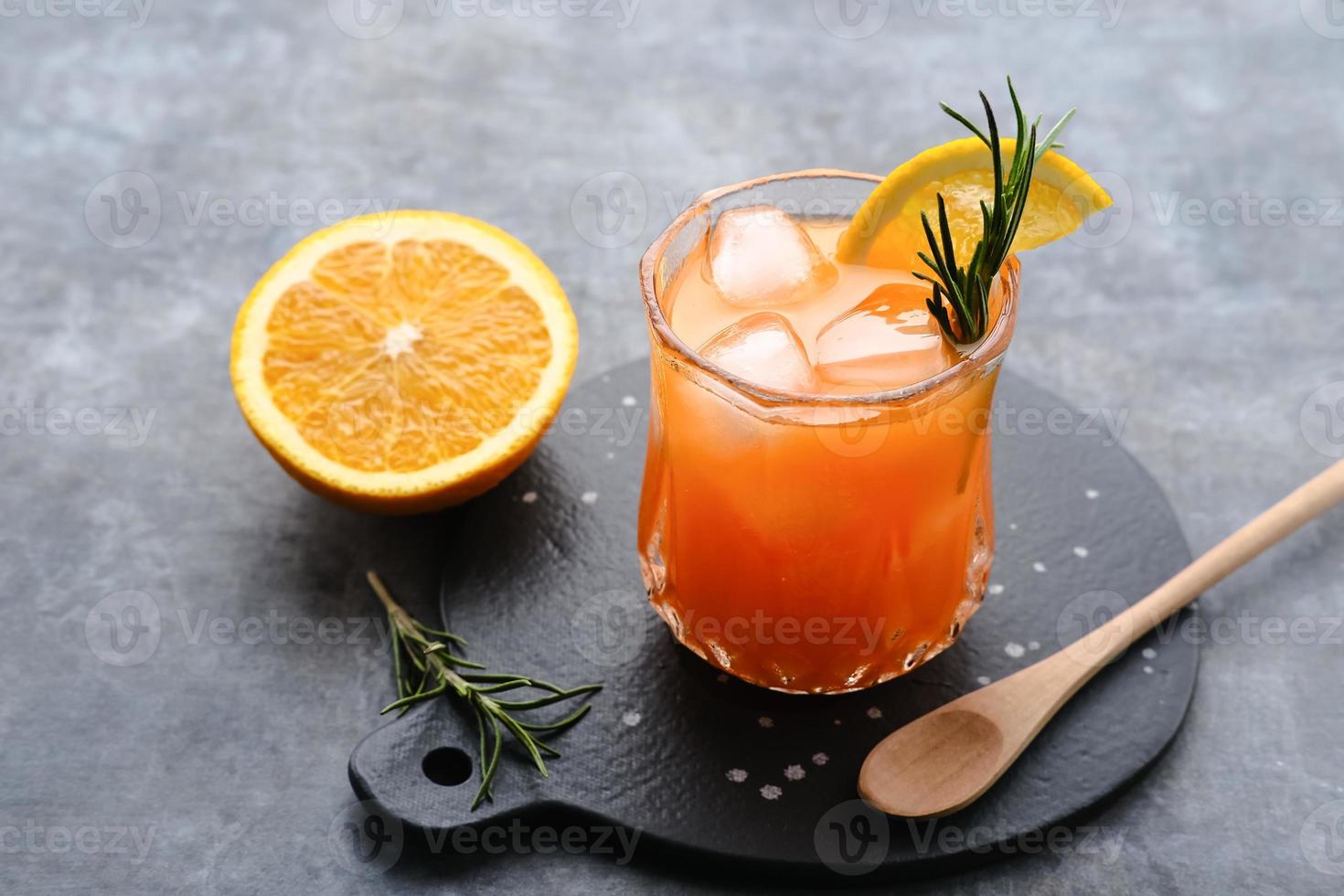 Orange juice in glass, cold pressed juice photo