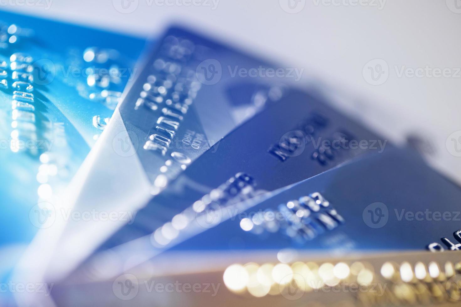 Credit card payment with close up shot isolated on white background,selective focus. photo