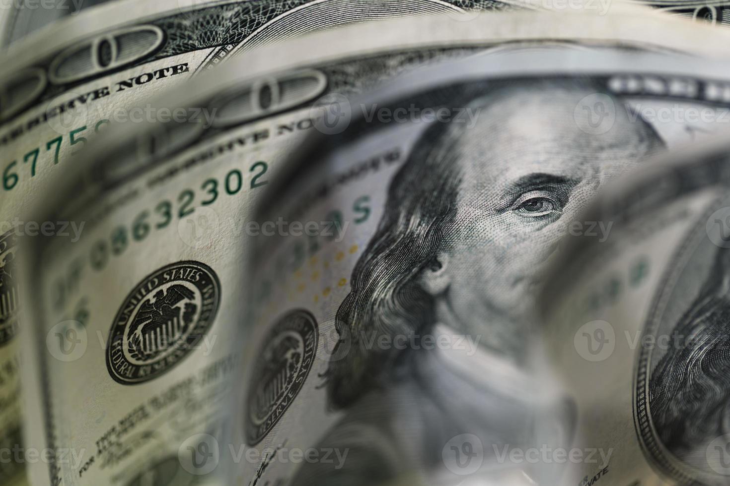 Macro close up of Ben Franklin's face on the US 100 dollar photo