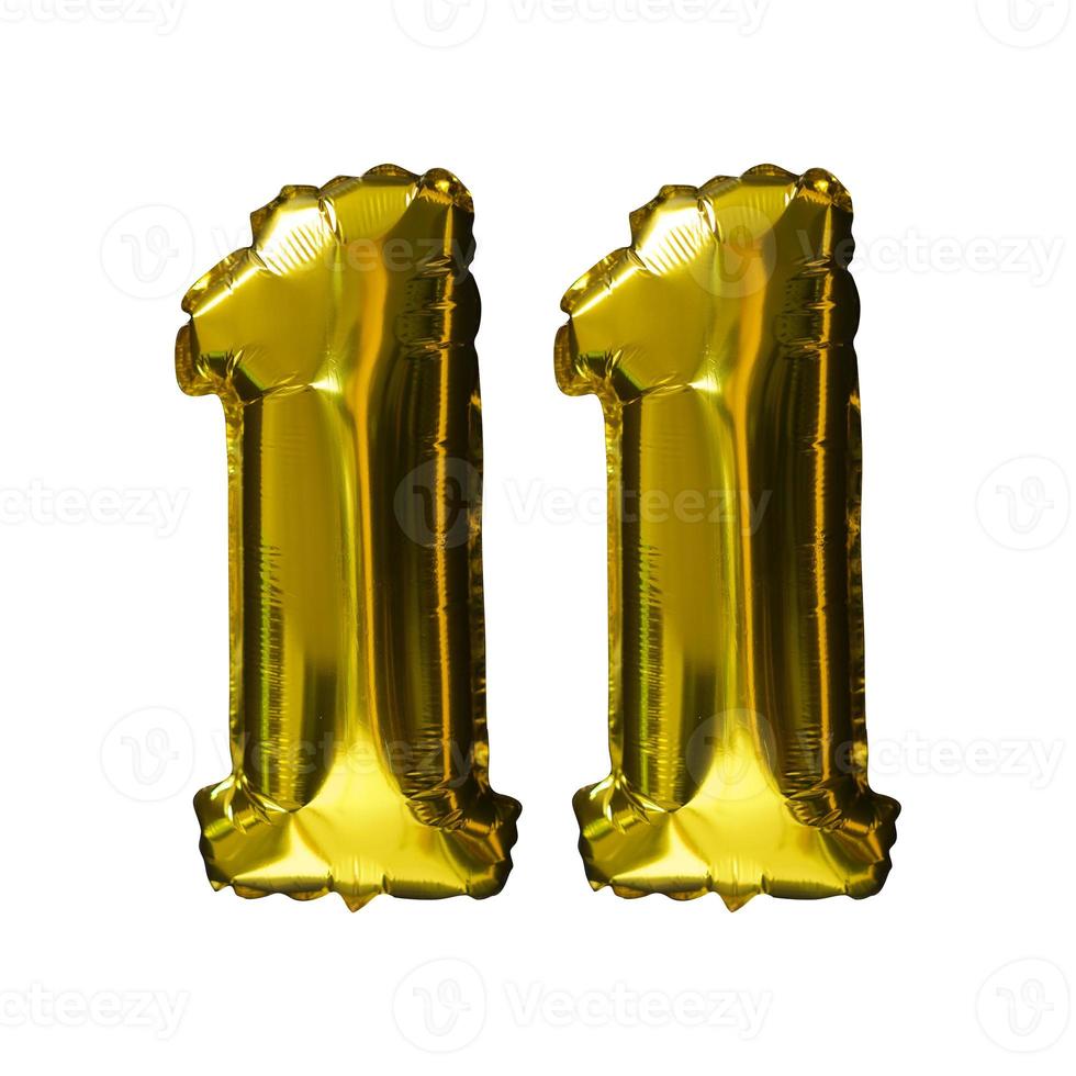 11 Golden number helium balloons isolated background. Realistic foil and latex balloons. design elements for party, event, birthday, anniversary and wedding. photo