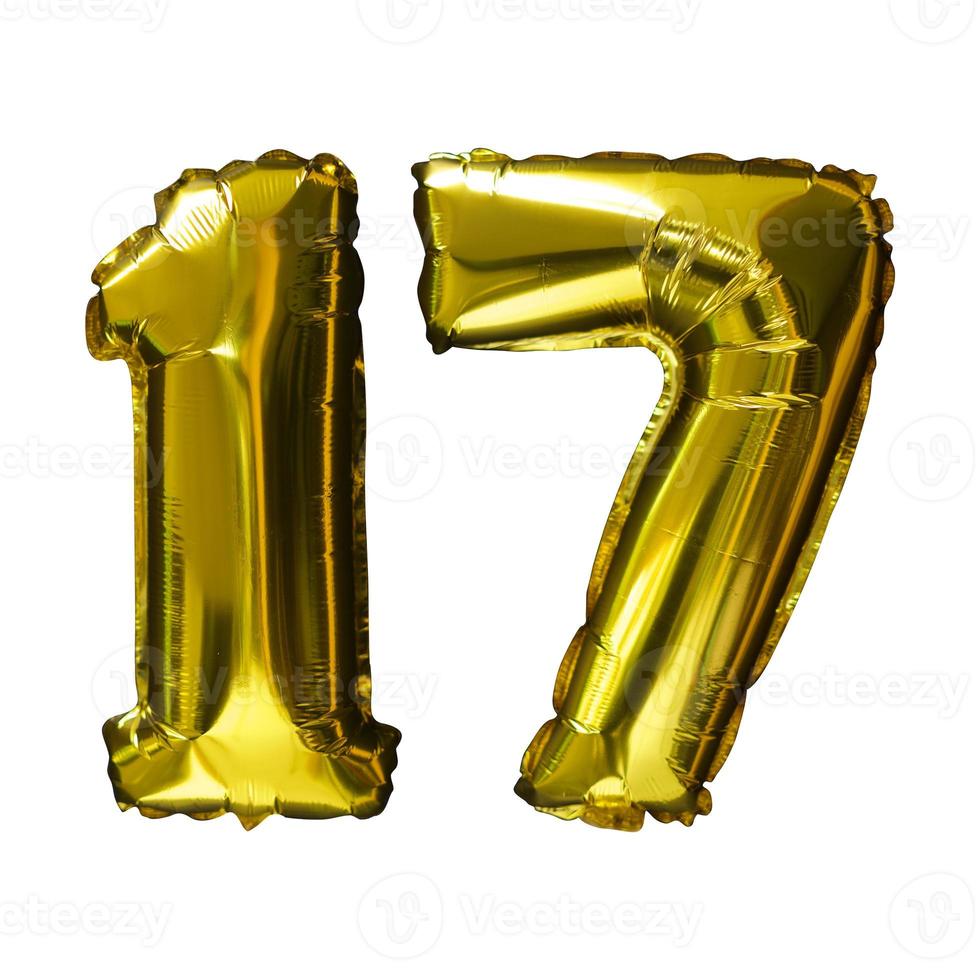 17 Golden number helium balloons isolated background. Realistic foil and latex balloons. design elements for party, event, birthday, anniversary and wedding. photo