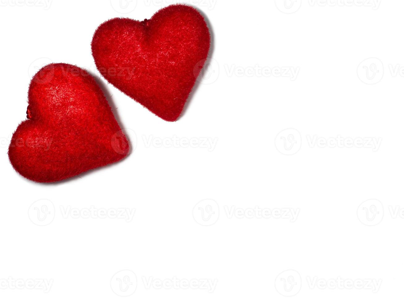 Two red hearts on white paper. Postcard for valentine's day. Happy valentine's day greetings. Romantic background.  Mockup photo