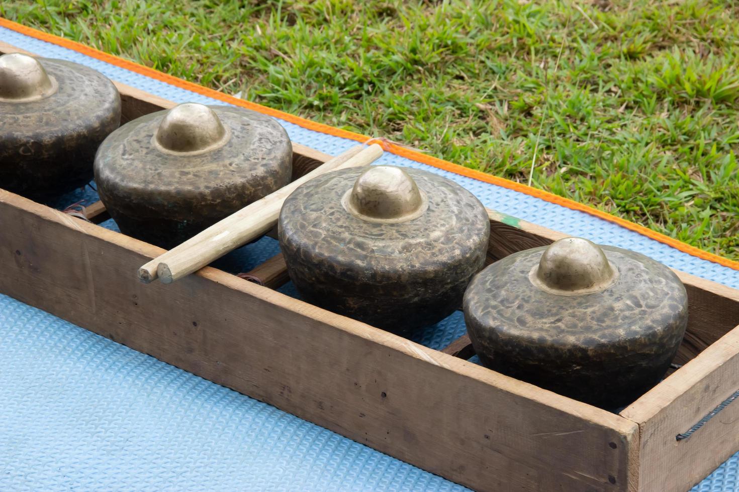 gamelan on a green grass background at a celebration event photo