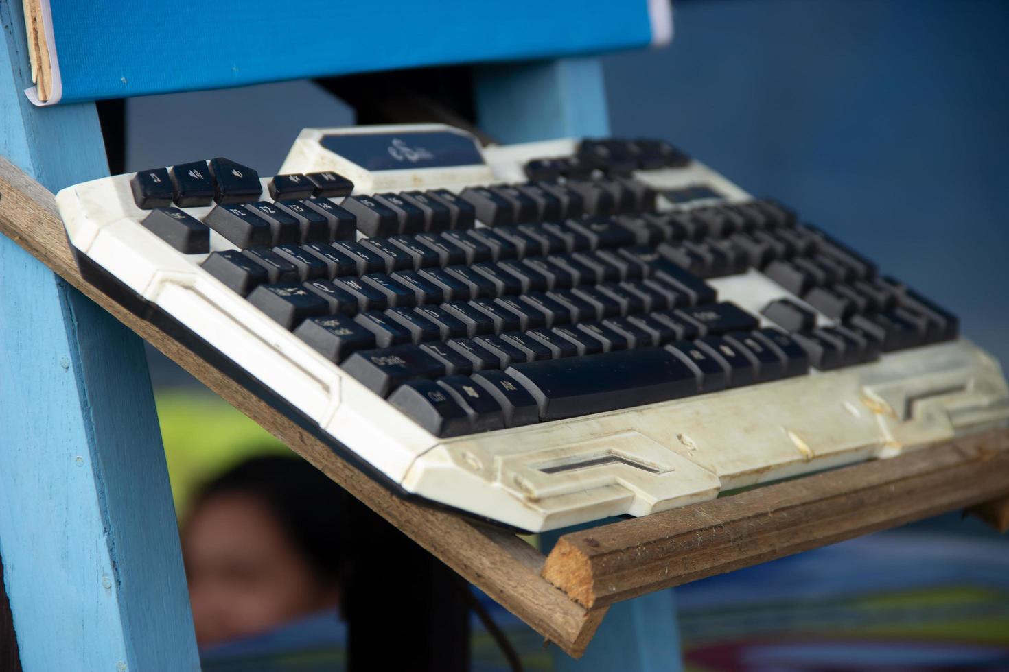 keyboard that is placed outdoors and on display photo