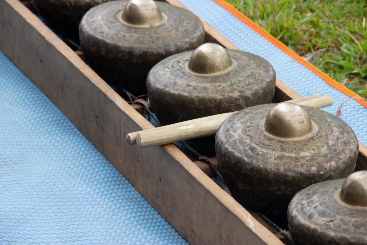 gamelan on a green grass background at a celebration event photo